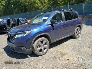 ✅ 2021 Honda Passport Touring • VIN: 5FNYF8H92MB042258 • Lot: 68150945. Listed on Copart with 60,684 mi. Free auction sales archive from the USA and detailed vehicle history report at DreamBid. Image 1.