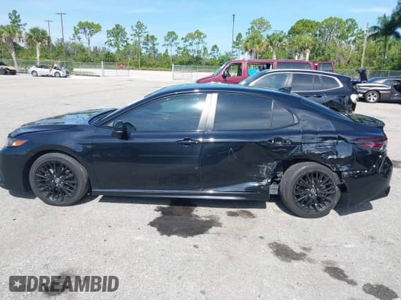 2022 Toyota Camry SE z VIN 4T1T11AK0NU044270, wystawiony jako IAAI lot #42805286 z przebiegiem 49 468 mil mil oraz . Historia ofert i sprzedaży dostępna na DreamBid. Obrazek 14.