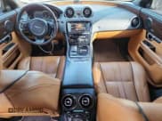 ✅ 2014 Jaguar XJ Portfolio • VIN: SAJWJ2GD9E8V67295 • Lot: 67207105. Listed on Copart with 121,936 mi. Free auction sales archive from the USA and detailed vehicle history report at DreamBid. Image 8.