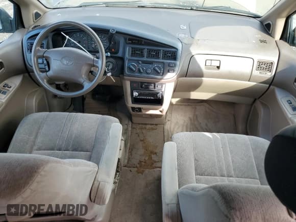 ✅ 1999 Toyota Sienna LE • VIN: 4T3ZF13C0XU133039 • Лот: 51162645. Опубликован ранее на Copart с пробегом 182 318 миль. Бесплатный доступ к архиву аукционных продаж из США и подробный отчёт об истории автомобиля на DreamBid. Изображение 8.