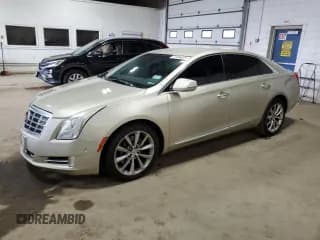 ✅ 2014 Cadillac XTS Luxury • VIN: 2G61M5S34E9151176 • Lot: 71496625. Listed on Copart with 126,857 mi. Free auction sales archive from the USA and detailed vehicle history report at DreamBid. Image 1.