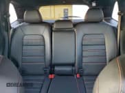 ✅ 2025 Honda CR-V Sport Touring • VIN: 7FARS6H97SE103299 • Lot: 94969925. Wystawiony na Copart z przebiegiem 2 002 mil. Bezpłatny archiwum sprzedaży aukcyjnych z USA i szczegółowy raport historii pojazdu na DreamBid. Zdjęcie 10.