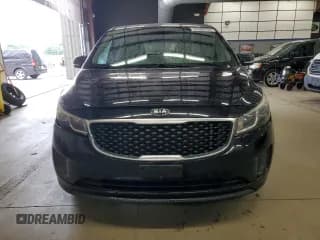 ✅ 2017 Kia Sedona L • VIN: KNDMA5C15H6291720 • Lot: 91606705. Listed on Copart with 128,486 mi. Free auction sales archive from the USA and detailed vehicle history report at DreamBid. Image 5.