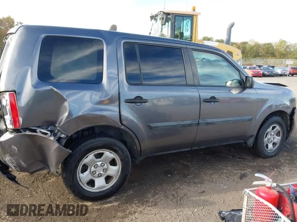 ✅ 2015 Honda Pilot LX • VIN: 5FNYF3H24FB008525 • Lot: 43559535. Listed on IAAI with 183,249 mi. Free auction sales archive from the USA and detailed vehicle history report at DreamBid. Image 14.