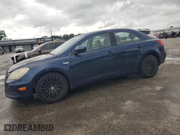 ✅ 2012 Suzuki Kizashi SE • VIN: JS2RE9A36C6100178 • Lot: 54519445. Listed on Copart with 103,342 mi. Free auction sales archive from the USA and detailed vehicle history report at DreamBid. Image 1.