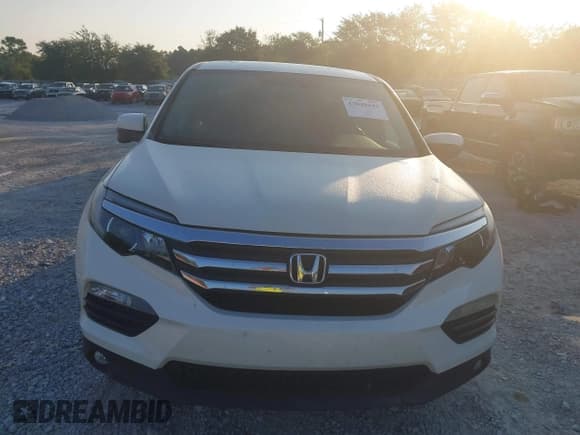 ✅ 2017 Honda Pilot EX-L • VIN: 5FNYF5H7XHB014193 • Lot: 43040443. Listed on IAAI with 246,920 mi. Free auction sales archive from the USA and detailed vehicle history report at DreamBid. Image 12.