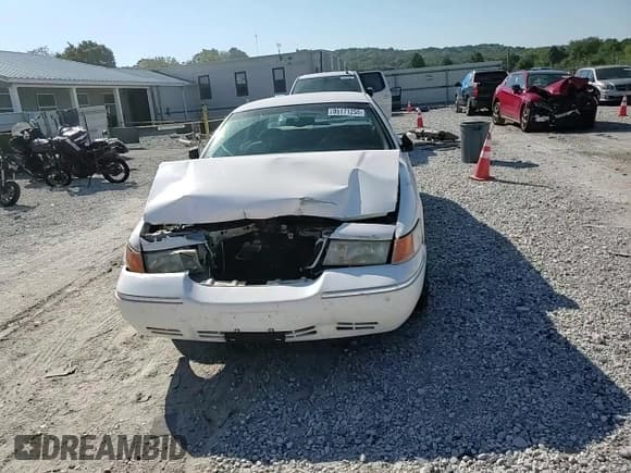 ✅ 2000 Mercury Grand Marquis LS • VIN: 2MEFM75W7YX699174 • Лот: 85171255. Опубликован ранее на Copart с пробегом 156 283 миль. Бесплатный доступ к архиву аукционных продаж из США и подробный отчёт об истории автомобиля на DreamBid. Изображение 14.