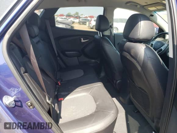 2013 Hyundai Tucson GLS z VIN KM8JUCACXDU639919, wystawiony jako Copart lot #65448984 z przebiegiem Nie podano mil oraz Szkoda całkowita • Salvage title. Historia ofert i sprzedaży dostępna na DreamBid. Obrazek 11.