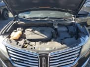 ✅ 2015 Lincoln MKC • VIN: 5LMTJ2AH6FUJ06182 • Lot: 90999195. Wystawiony na Copart z przebiegiem 89 880 mil. Bezpłatny archiwum sprzedaży aukcyjnych z USA i szczegółowy raport historii pojazdu na DreamBid. Zdjęcie 11.