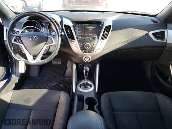 2017 Hyundai Veloster z VIN KMHTC6AD6HU320948, wystawiony jako Copart lot #45232853 z przebiegiem 34 130 mil mil oraz . Historia ofert i sprzedaży dostępna na DreamBid. Obrazek 8.