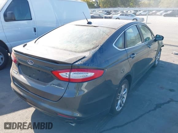 ✅ 2015 Ford Fusion Titanium • VIN: 3FA6P0SU8FR243611 • Lot: 43169838. Wystawiony na IAAI z przebiegiem 131 248 mil. Bezpłatny archiwum sprzedaży aukcyjnych z USA i szczegółowy raport historii pojazdu na DreamBid. Zdjęcie 4.