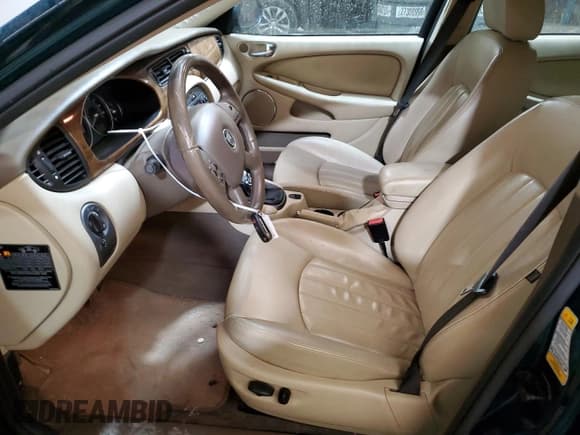 ✅ 2004 Jaguar X-Type • VIN: SAJEB52D54XD98806 • Lot: 52204795. Wystawiony na Copart z przebiegiem 165 440 mil. Bezpłatny archiwum sprzedaży aukcyjnych z USA i szczegółowy raport historii pojazdu na DreamBid. Zdjęcie 7.