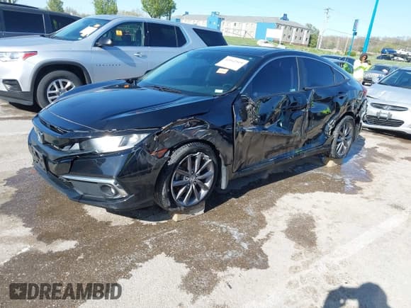 ✅ 2020 Honda Civic EX-L • VIN: 19XFC1F73LE017656 • Lot: 42042519. Listed on IAAI with 70,496 mi. Free auction sales archive from the USA and detailed vehicle history report at DreamBid. Image 2.