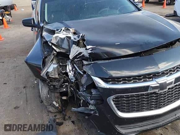 2015 Chevrolet Malibu LS z VIN 1G11B5SL9FF285640, wystawiony jako Copart lot #82276285 z przebiegiem 137 727 mil mil oraz Szkoda całkowita • Salvage title. Historia ofert i sprzedaży dostępna na DreamBid. Obrazek 13.