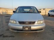 ✅ 1997 Honda Odyssey • VIN: JHMRA1842VC003732 • Lot: 86205204. Listed on Copart with 136,693 mi. Free auction sales archive from the USA and detailed vehicle history report at DreamBid. Image 5.