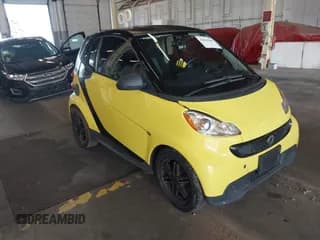 ✅ 2013 Smart fortwo Pure • VIN: WMEEJ3BA9DK663525 • Lot: 42863988. Wystawiony na IAAI z przebiegiem 98 454 mil. Bezpłatny archiwum sprzedaży aukcyjnych z USA i szczegółowy raport historii pojazdu na DreamBid. Zdjęcie 1.
