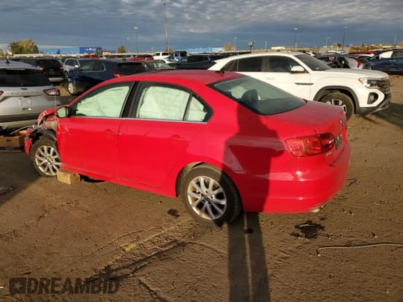 ✅ 2014 Volkswagen Jetta SE • VIN: 3VWD17AJ1EM326521 • Lot: 86629815. Listed on Copart with 99,660 mi. Free auction sales archive from the USA and detailed vehicle history report at DreamBid. Image 2.