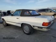 ✅ 1989 Mercedes-Benz 560 SL • VIN: WDBBA48D7KA100290 • Lot: 85049924. Listed on Copart with 88,919 mi. Free auction sales archive from the USA and detailed vehicle history report at DreamBid. Image 2.