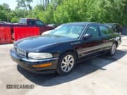 ✅ 2003 Buick Park Avenue Ultra • VIN: 1G4CU541834158421 • Lot: 42286959. Wystawiony na IAAI z przebiegiem 136 911 mil. Bezpłatny archiwum sprzedaży aukcyjnych z USA i szczegółowy raport historii pojazdu na DreamBid. Zdjęcie 2.