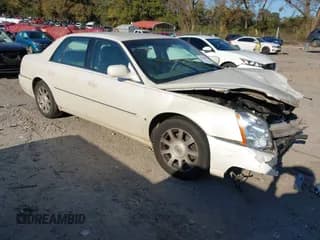 ✅ 2008 Cadillac DTS 1SC • VIN: 1G6KD57YX8U171710 • Lot: 43611887. Listed on IAAI with 247,721 mi. Free auction sales archive from the USA and detailed vehicle history report at DreamBid. Image 1.