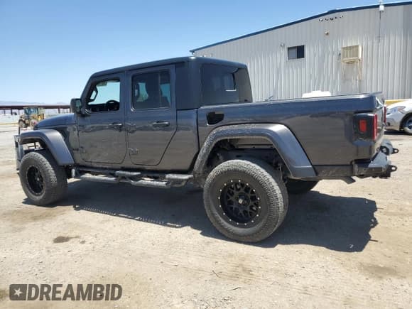 ✅ 2022 Jeep Gladiator Willys Sport • VIN: 1C6HJTAG2NL133000 • Лот: 58416125. Опубликован ранее на Copart с пробегом 65 590 миль. Бесплатный доступ к архиву аукционных продаж из США и подробный отчёт об истории автомобиля на DreamBid. Изображение 2.
