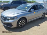 ✅ 2024 Volkswagen Jetta S • VIN: 3VW5M7BUXRM088453 • Лот: 42000829. Опубликован ранее на IAAI с пробегом 14 561 миль. Бесплатный доступ к архиву аукционных продаж из США и подробный отчёт об истории автомобиля на DreamBid. Изображение 2.