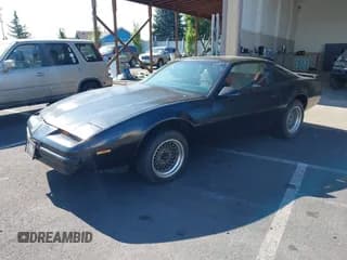 ✅ 1986 Pontiac Firebird • VIN: 1G2FS87S3GL207036 • Lot: 42889294. Listed on IAAI with 103,203 mi. Free auction sales archive from the USA and detailed vehicle history report at DreamBid. Image 2.