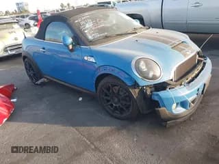 ✅ 2013 MINI Roadster S • VIN: WMWSY3C55DT594628 • Lot: 41316950. Listed on IAAI with 77,399 mi. Free auction sales archive from the USA and detailed vehicle history report at DreamBid. Image 1.