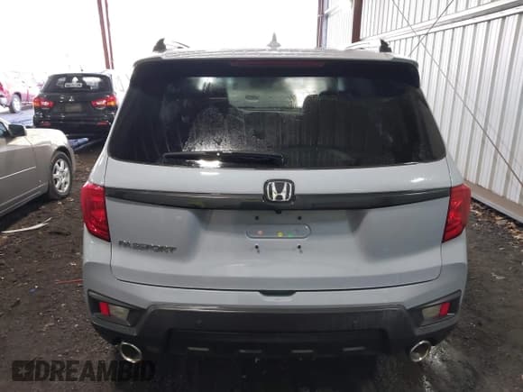 ✅ 2022 Honda Passport EX-L • VIN: 5FNYF7H52NB000679 • Lot: 41449757. Listed on IAAI with 38,672 mi. Free auction sales archive from the USA and detailed vehicle history report at DreamBid. Image 16.