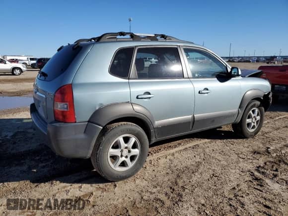 2005 Hyundai Tucson GLS z VIN KM8JN12D65U205376, wystawiony jako Copart lot #80544984 z przebiegiem 188 549 mil mil oraz Szkoda całkowita • Salvage title. Historia ofert i sprzedaży dostępna na DreamBid. Obrazek 3.