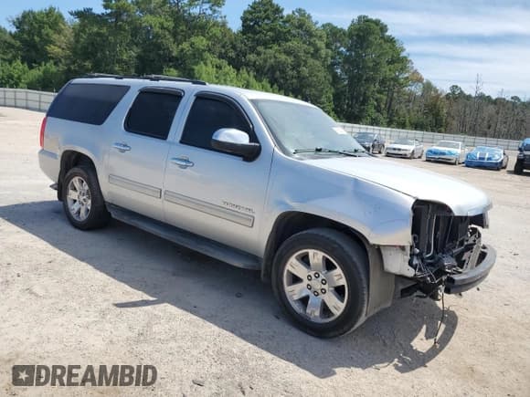 ✅ 2012 GMC Yukon XL SLT • VIN: 1GKS1KE06CR225084 • Lot: 69927615. Listed on Copart with 211,410 mi. Free auction sales archive from the USA and detailed vehicle history report at DreamBid. Image 4.