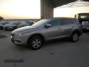 ✅ 2015 Mazda CX-9 Touring • VIN: JM3TB2CA2F0458422 • Lot: 91915115. Wystawiony na Copart z przebiegiem 149 348 mil. Bezpłatny archiwum sprzedaży aukcyjnych z USA i szczegółowy raport historii pojazdu na DreamBid. Zdjęcie 1.