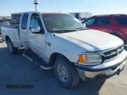 ✅ 1998 Ford F-150 • VIN: 2FTZX1760WCA98189 • Lot: 43675999. Listed on IAAI with 170,108 mi. Free auction sales archive from the USA and detailed vehicle history report at DreamBid. Image 1.