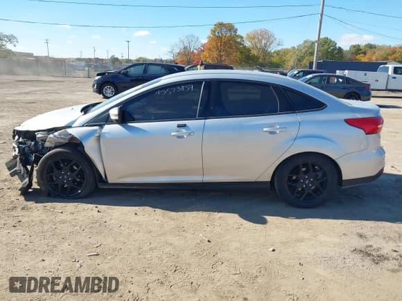 ✅ 2016 Ford Focus SE • VIN: 1FADP3F2XGL243059 • Lot: 43573859. Listed on IAAI with 104,132 mi. Free auction sales archive from the USA and detailed vehicle history report at DreamBid. Image 14.