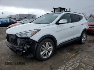 ✅ 2015 Hyundai Santa Fe • VIN: 5XYZWDLA0FG256952 • Лот: 42424843. Опубликован ранее на Copart с пробегом 103 091 миль. Бесплатный доступ к архиву аукционных продаж из США и подробный отчёт об истории автомобиля на DreamBid. Изображение 1.
