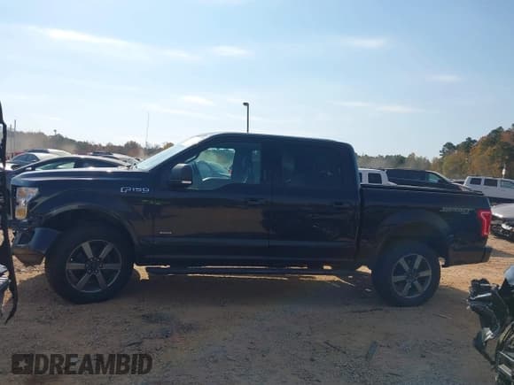 ✅ 2015 Ford F-150 Lariat • VIN: 1FTEW1EG2FKE43828 • Lot: 43627052. Listed on IAAI with 128,841 mi. Free auction sales archive from the USA and detailed vehicle history report at DreamBid. Image 14.
