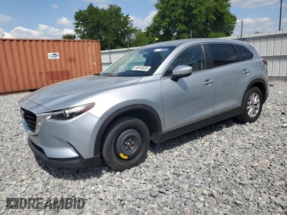 ✅ 2016 Mazda CX-9 Sport • VIN: JM3TCABY3G0100933 • Lot: 50616655. Listed on Copart with 158,749 mi. Free auction sales archive from the USA and detailed vehicle history report at DreamBid. Image 1.