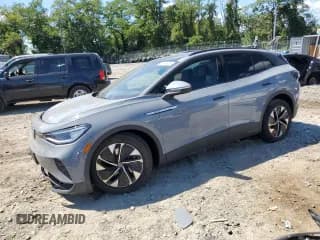 ✅ 2022 Volkswagen ID.4 Pro S • VIN: WVGTMPE26NP050416 • Лот: 70428625. Опубликован ранее на Copart с пробегом 20 840 миль. Бесплатный доступ к архиву аукционных продаж из США и подробный отчёт об истории автомобиля на DreamBid. Изображение 1.