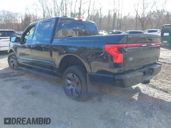 ✅ 2023 Ford F-150 Lightning Pro • VIN: 1FTVW1EV5PWG34863 • Lot: 41995387. Listed on IAAI with 15,701 mi. Free auction sales archive from the USA and detailed vehicle history report at DreamBid. Image 3.