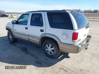 ✅ 2001 Oldsmobile Bravada • VIN: 1GHDT13W512107415 • Lot: 41678324. Listed on IAAI with 256,968 mi. Free auction sales archive from the USA and detailed vehicle history report at DreamBid. Image 3.