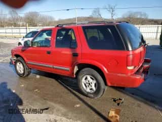2000 Chevrolet Blazer LT z VIN 1GNDT13W1Y2272773, wystawiony jako Copart lot #88475175 z przebiegiem 197 171 mil mil oraz Szkoda całkowita • Salvage title. Historia ofert i sprzedaży dostępna na DreamBid. Obrazek 2.