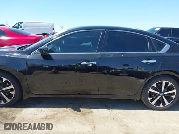 ✅ 2018 Nissan Altima S • VIN: 1N4AL3AP0JC101621 • Lot: 43117296. Listed on IAAI with 87,767 mi. Free auction sales archive from the USA and detailed vehicle history report at DreamBid. Image 14.