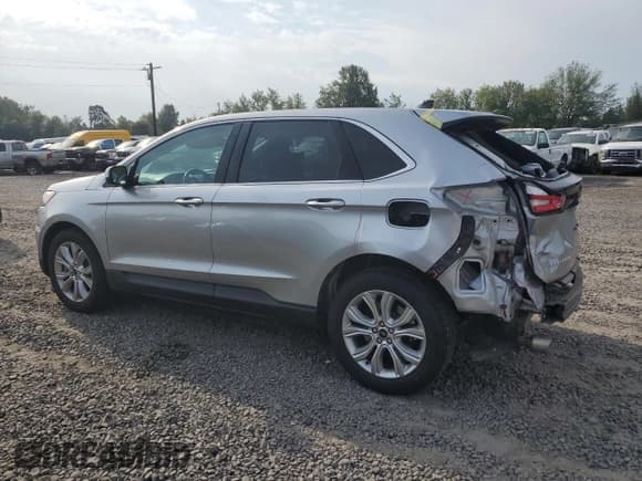 ✅ 2023 Ford Edge Titanium • VIN: 2FMPK4K99PBA29951 • Лот: 69757105. Опубликован ранее на Copart с пробегом 60 912 миль. Бесплатный доступ к архиву аукционных продаж из США и подробный отчёт об истории автомобиля на DreamBid. Изображение 2.