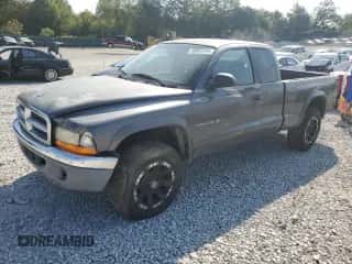 2001 Dodge Dakota Sport с VIN 1B7GG22N71S336152, выставлен на аукционе Copart как лот 70697244 с пробегом 256 693 миль миль и Списание • Salvage title. История ставок и продаж доступна на DreamBid. Изображение 1.