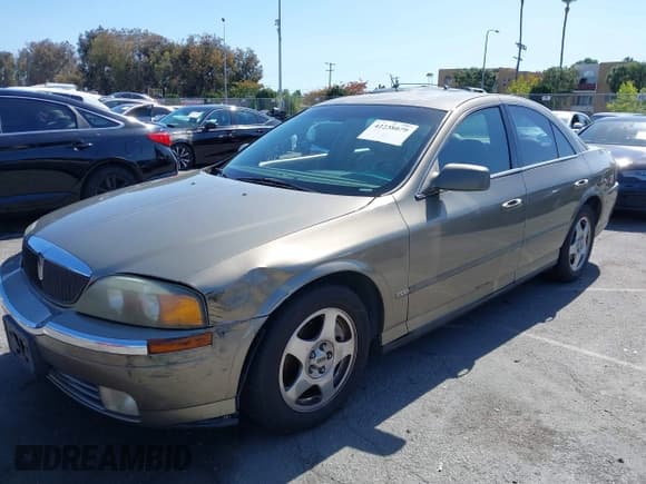 ✅ 2001 Lincoln LS Sport • VIN: 1LNHM86S31Y714332 • Лот: 42238079. Опубликован ранее на IAAI с пробегом 74 152 миль. Бесплатный доступ к архиву аукционных продаж из США и подробный отчёт об истории автомобиля на DreamBid. Изображение 17.