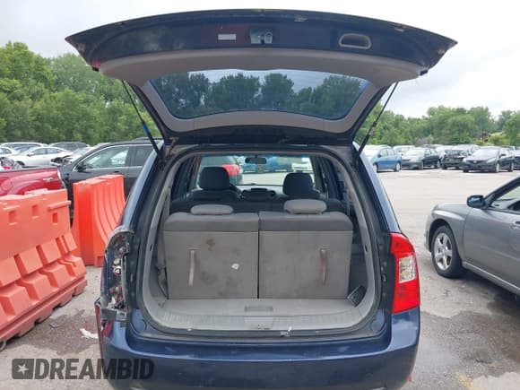 ✅ 2007 Kia Rondo EX • VIN: KNAFG526977096908 • Lot: 42756730. Wystawiony na IAAI z przebiegiem 179 432 mil. Bezpłatny archiwum sprzedaży aukcyjnych z USA i szczegółowy raport historii pojazdu na DreamBid. Zdjęcie 12.