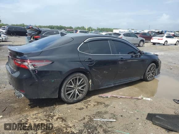 2023 Toyota Camry SE Nightshade с VIN 4T1T11AK6PU814054, выставлен на аукционе Copart как лот 85527505 с пробегом 70 953 миль миль и Списание • Salvage title. История ставок и продаж доступна на DreamBid. Изображение 3.