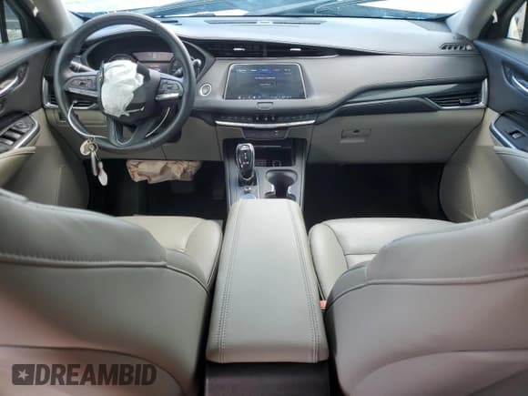 ✅ 2023 Cadillac XT4 FWD Premium Luxury • VIN: 1GYFZCR47PF105143 • Lot: 52397695. Listed on Copart with 42,740 mi. Free auction sales archive from the USA and detailed vehicle history report at DreamBid. Image 8.