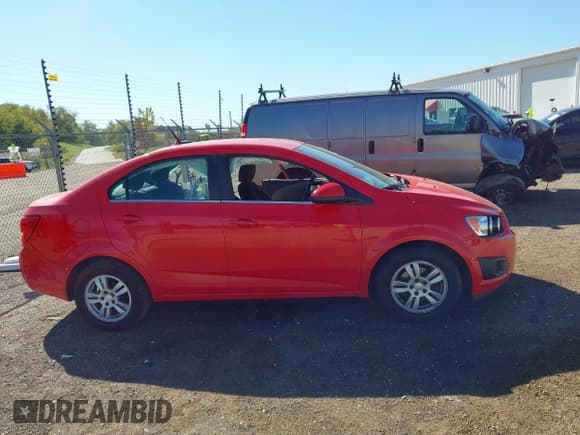 ✅ 2014 Chevrolet Sonic LT • VIN: 1G1JC5SB3E4243298 • Lot: 43349669. Listed on IAAI with 151,831 mi. Free auction sales archive from the USA and detailed vehicle history report at DreamBid. Image 14.