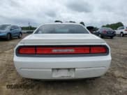 ✅ 2013 Dodge Challenger SXT • VIN: 2C3CDYAG4DH530537 • Lot: 52118944. Wystawiony na Copart z przebiegiem 223 245 mil. Bezpłatny archiwum sprzedaży aukcyjnych z USA i szczegółowy raport historii pojazdu na DreamBid. Zdjęcie 6.